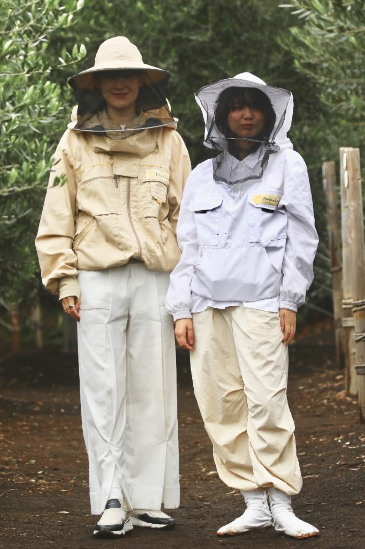 グリーンコート ススキを持つモデル